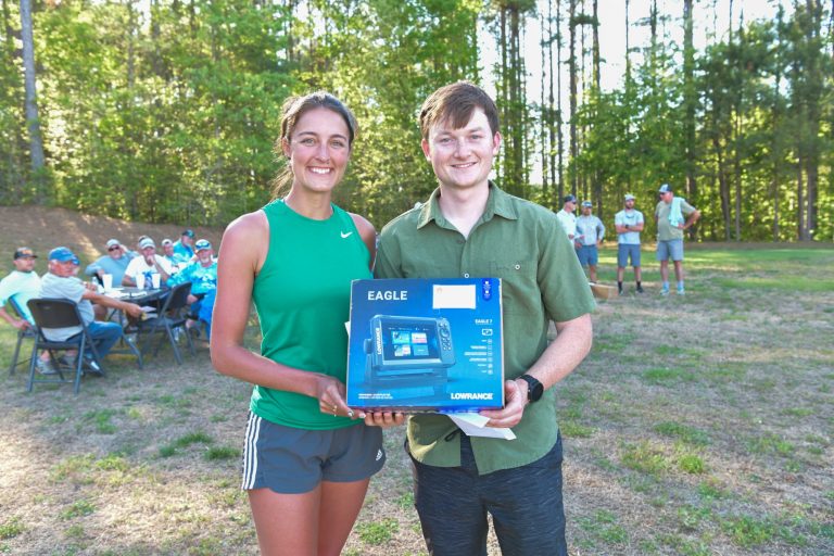 Raffle winner (Ely Yancey and Rep from SESCO lighting)