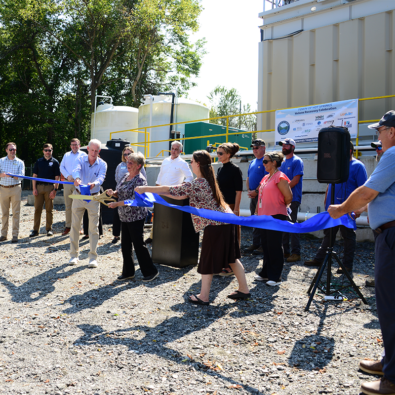 Mayor Abby Norton cuts the ribbon at the new package WWTP.